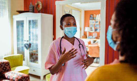 nurse and patient in home