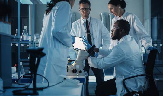 Four scientists in lab