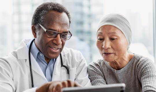Male doctor with patient