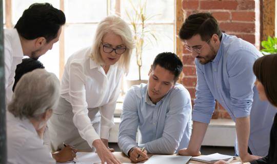 Group of associates talking