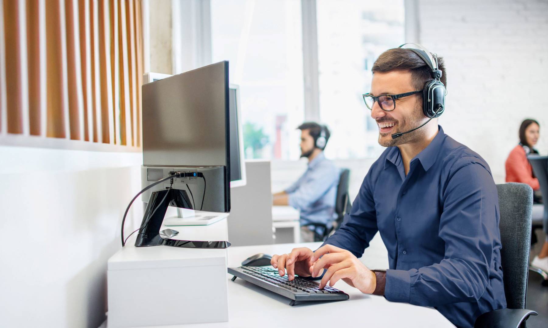 World Courier customer service representative speaking to a client