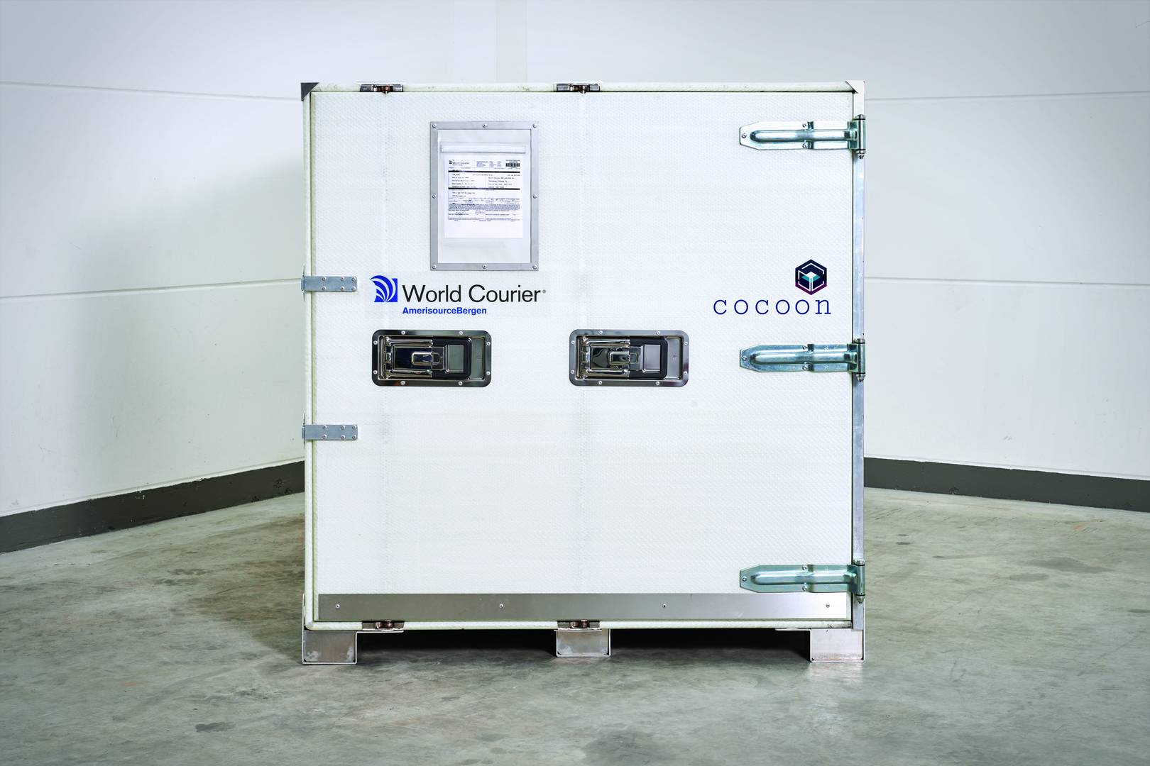 A cocoon shipping unit with the door sealed, viewed from the loading end.