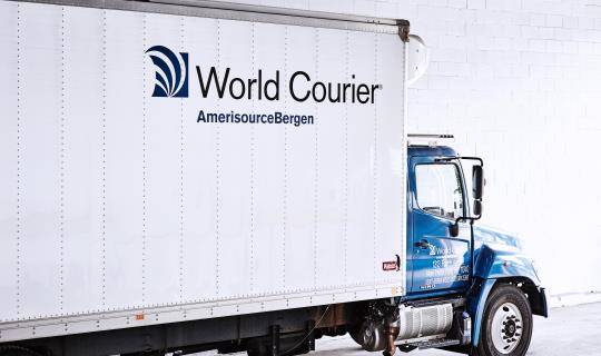 A large World Courier truck, or lorry.
