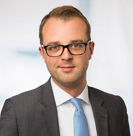 A portrait of Christopher Engel.