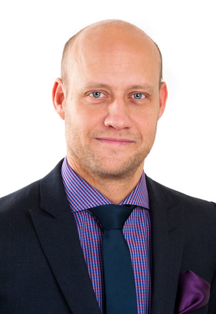 A portrait of Andreas Kjillander.